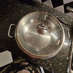 stainless steel wok and 3 serving platers