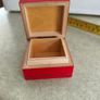 A small wooden trinket / gift box painted red with hand painted flower. Image 2