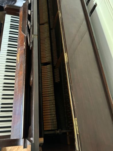 Upright piano and stool