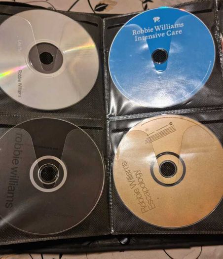 80 CD + Case. All CD's in perfect playable condition.