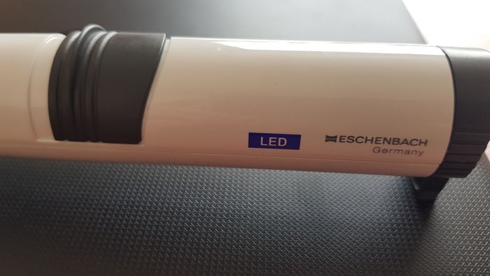 Magnifier with light. Eschenbach