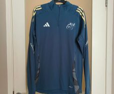 2024/2025 adidas Munster Rugby Training Half-Zip Top.