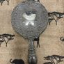 Vintage Ornate Silver-Tone Hand Mirror Floral Embossed Design. Image 2