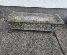 Old concrete planter