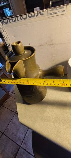 2 different itemes- 1-1960s Langley Sherwood Coffee Pot but stmpe been gone 60.00 euro.2- Ceramic Plant pot or vase 628/14 Made In Germany. 18.00 euro.
