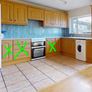 Bath, kitchen units, tap, wooden floor, radiators Image 6