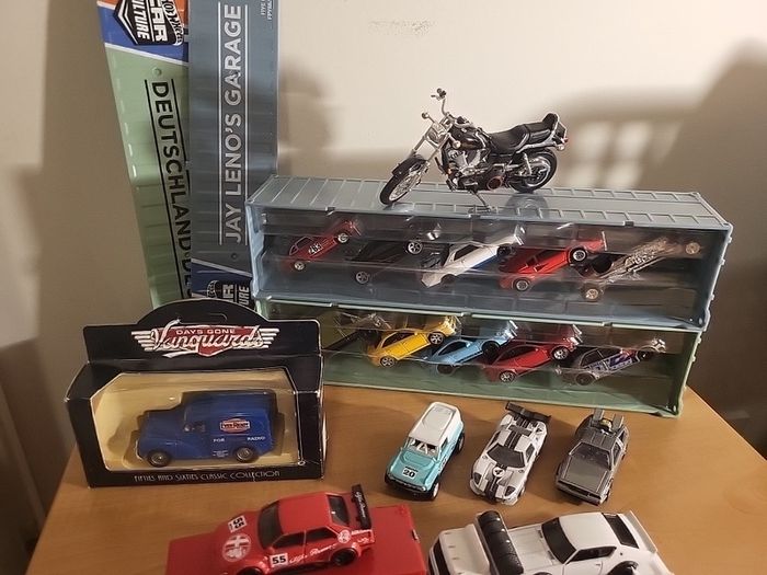 Assortment of diecast, primarily hot wheels premium, but includes a bike and lledo