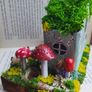 handcrafted fairy cottage with moss roof! Image 8