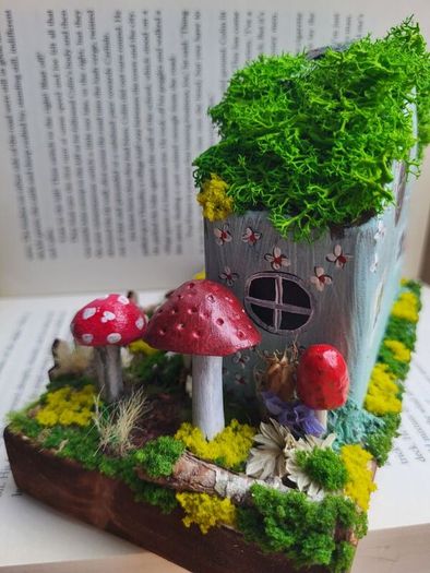 handcrafted fairy cottage with moss roof!