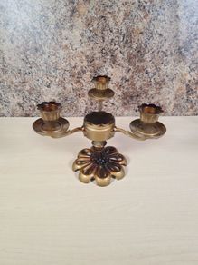 Three branch tabletop candlebra metal gold brown