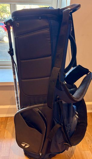 NEW - TaylorMade FlexTech Stand Bag (Black/Blue), stand legs still have the factory wrapping on them.