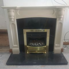 gas fire and fireplace.  Heats back boiler