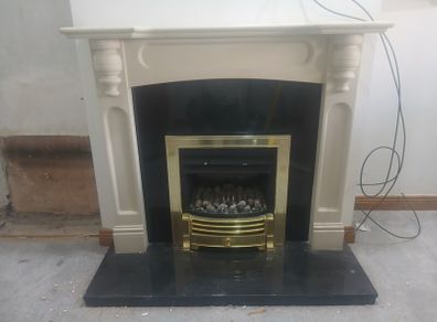 gas fire and fireplace.  Heats back boiler