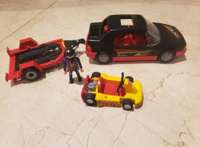 Playmobil racing car, driver, trailer and cart.