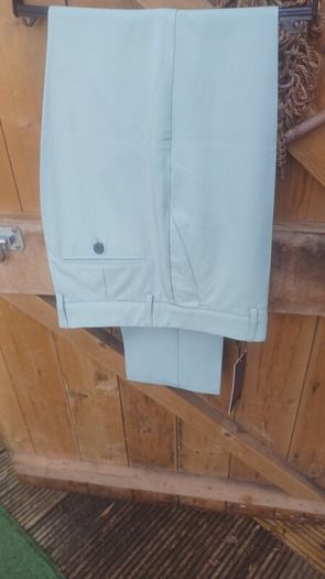 Druids sage colour golf jacket and trousers
