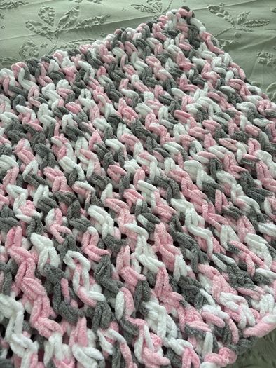 hand knitted baby blankets and cardigans