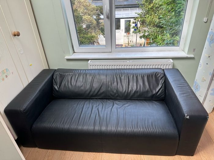 Black 2 seater sofa with removable legs