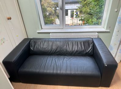 Black 2 seater sofa with removable legs