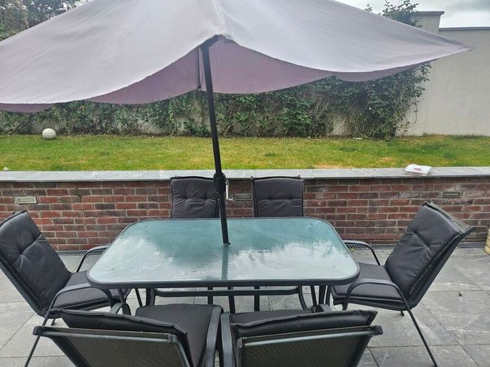 6 seater patio set and parasol