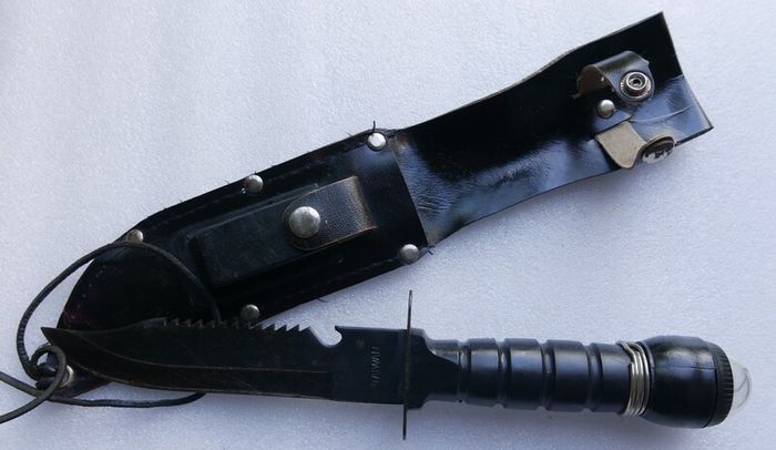 Vintage 1980s Survival Knife with compass and a storage compartment in the knife handle