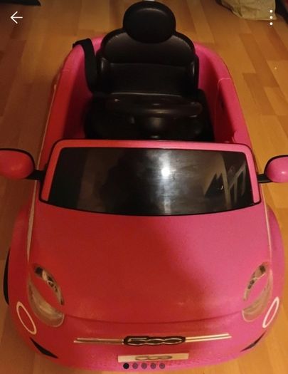 girls push along car