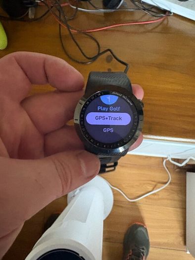 Golf watch with tags and spare tags