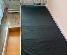 Single bed with headboard