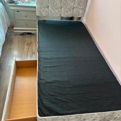 Single bed with headboard