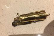 Lighter Brass with original cover