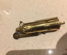 Lighter Brass with original cover