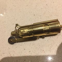 Lighter Brass with original cover
