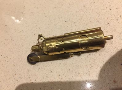 Lighter Brass with original cover