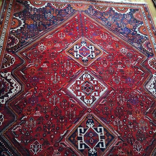 very large perasion rug