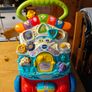 VTech First Steps Baby Walker, a popular 2-in-1 interactive push toy and activity center designed to help toddlers learn to walk.  Working perfectly. Image 5