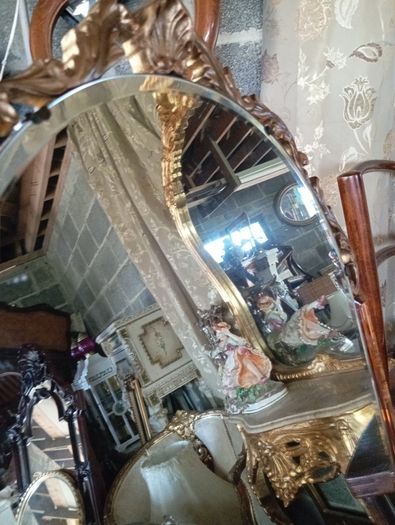 Vintage wall mirror with marble shelf