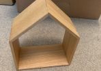 Wooden decoration in the shape of a house