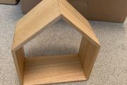 Wooden decoration in the shape of a house