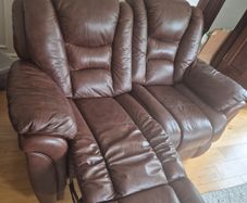 Brown two seater leather recliner