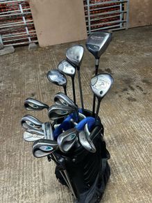 Full set of golf clubs with brand new grips