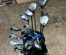 Full set of golf clubs with brand new grips