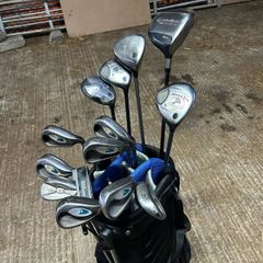 Full set of golf clubs with brand new grips