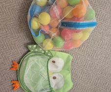 Bath toy holder and balls
