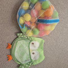 Bath toy holder and balls