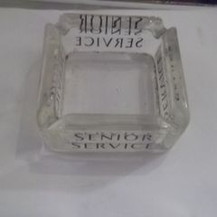 a vintage glass ash tray for senior service