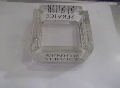 a vintage glass ash tray for senior service