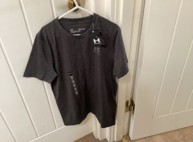 Performance T-shirt by Under Armour BNWT age 9/10