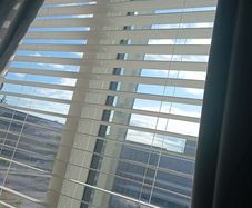 White wooden blinds