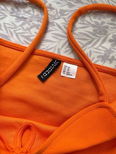 Orange halter neck dress