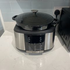 Cast iron slow cooker