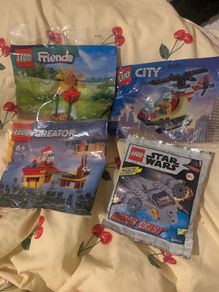 4 small Lego bags: friends, Star Wars, city